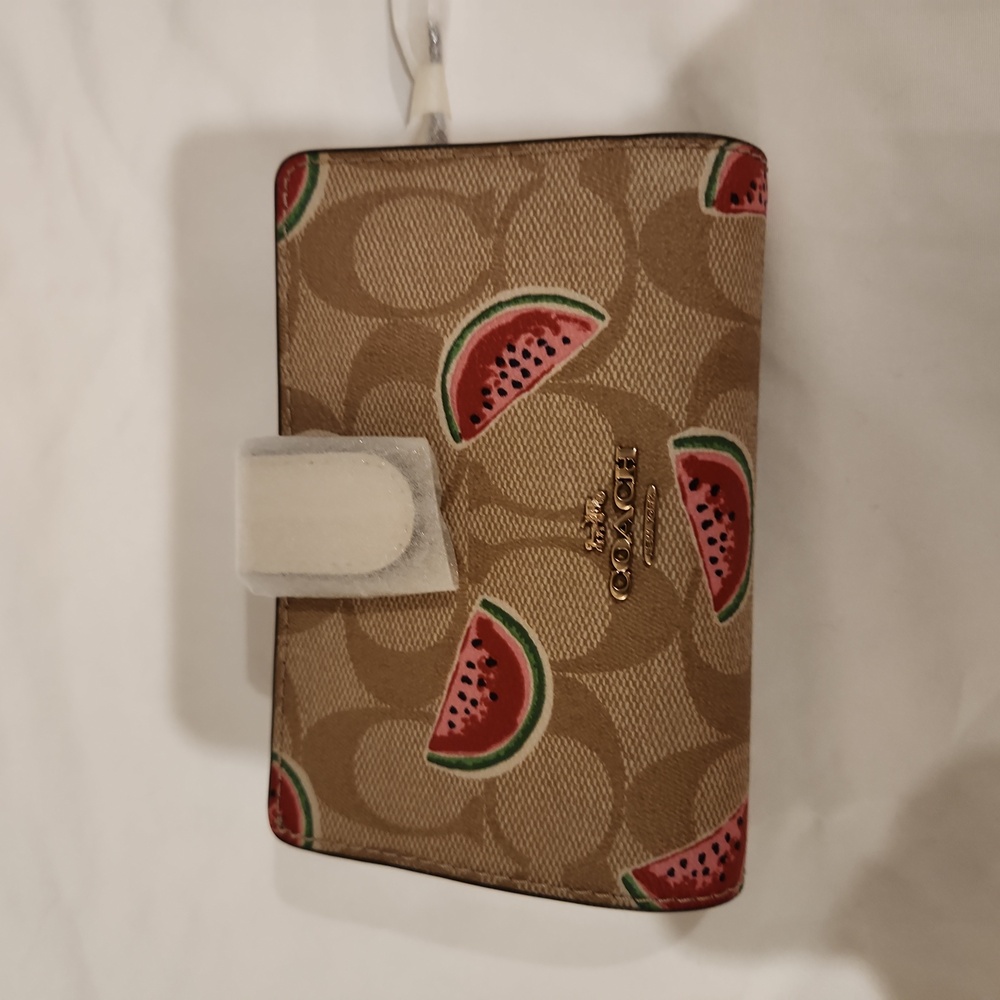 Coach medium corner zip wallet